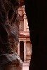 First glimpse of the Treasury  First glimpse of the iconic and probably best known structure of the ancient city of Petra: The Treasury (or locally known as Al-Khazneh). Upon exiting the 1.2km long Siq, this is the magnificent sight your presented with. The beautifully colored, Hellenistic facade is an astonishing piece of craftsmanship of a scale and grandeur guaranteed to evoke a wow. : Jordan