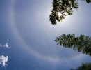 Halo around the sun caused by tiny ice crystals in the atmosphere, around Wùyuán. : China